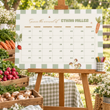 Locally Grown due date calendar poster on a wooden easel at a farmers market baby shower with produce crates and a cup of markers