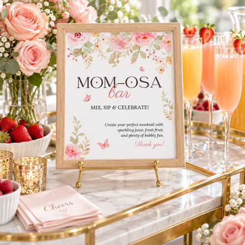 Pink floral Mom-osa bar sign on a gold easel on a bar cart