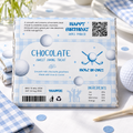 Golf hole in one 1st birthday chocolate bar wrapper on a party table with golf balls