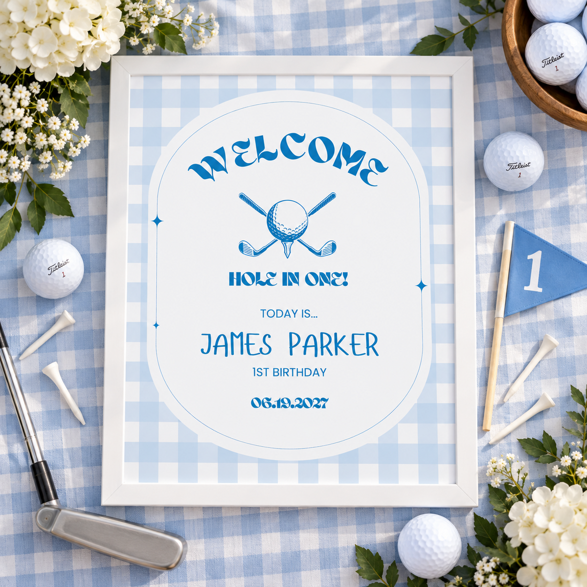 Flat lay of the blue gingham golf welcome sign with golf balls, tees and a flag