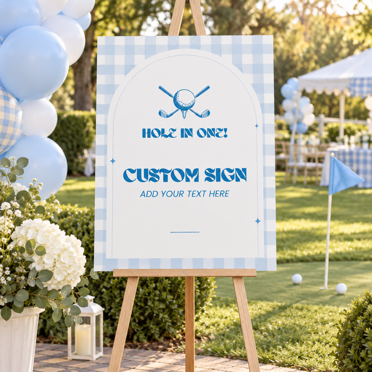 Large 16x20 golf first birthday custom sign on an easel at an outdoor party