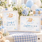 Little Bear Cards and Gifts sign and landscape custom sign on a blue and white baby shower side table