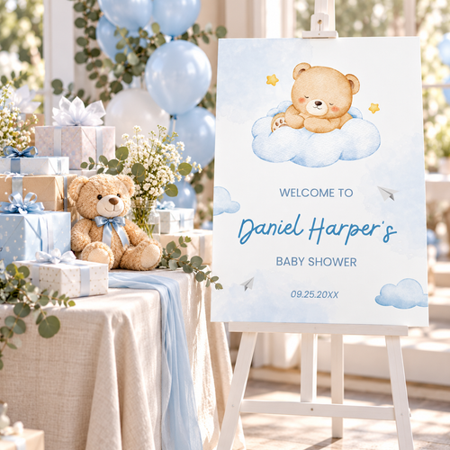 Little Bear teddy bear baby shower welcome sign on an easel at the entrance with blue balloons