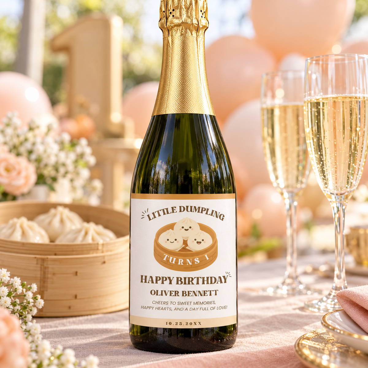 Little dumpling 1st birthday champagne label on a bottle with glasses and peach balloons