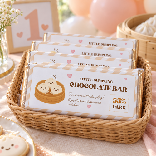 Basket of chocolate bars in little dumpling 1st birthday wrappers on a party favor table