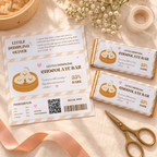 Flat lay of the printed little dumpling chocolate wrapper sheet with two wrapped bars and scissors
