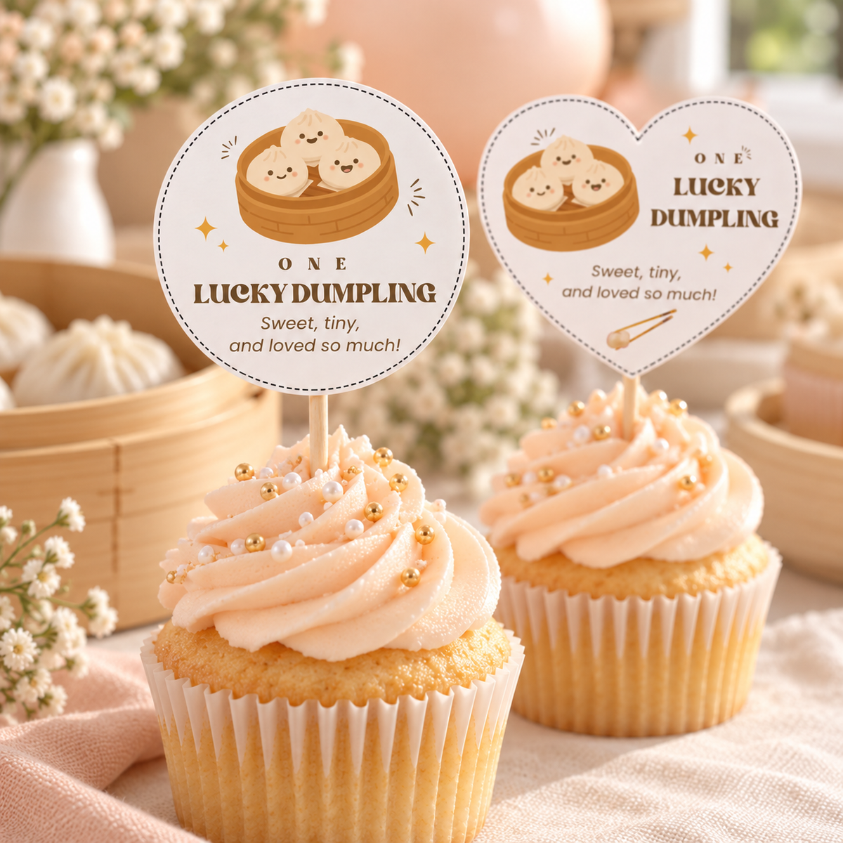 Close-up of peach cupcakes with the round and heart dumpling cupcake toppers