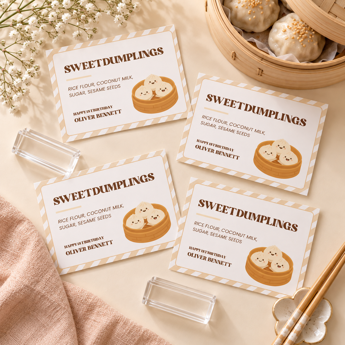 Flat lay of printed little dumpling food labels with acrylic stands and chopsticks