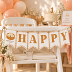 Little dumpling HAPPY banner strung on a white high chair at a 1st birthday