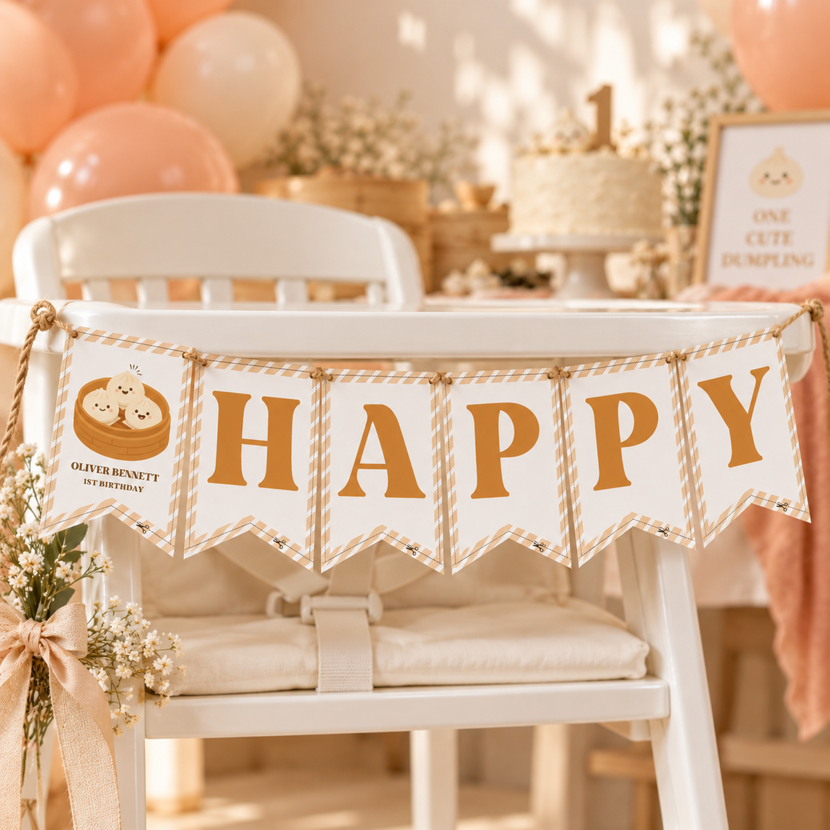 Little dumpling HAPPY banner strung on a white high chair at a 1st birthday
