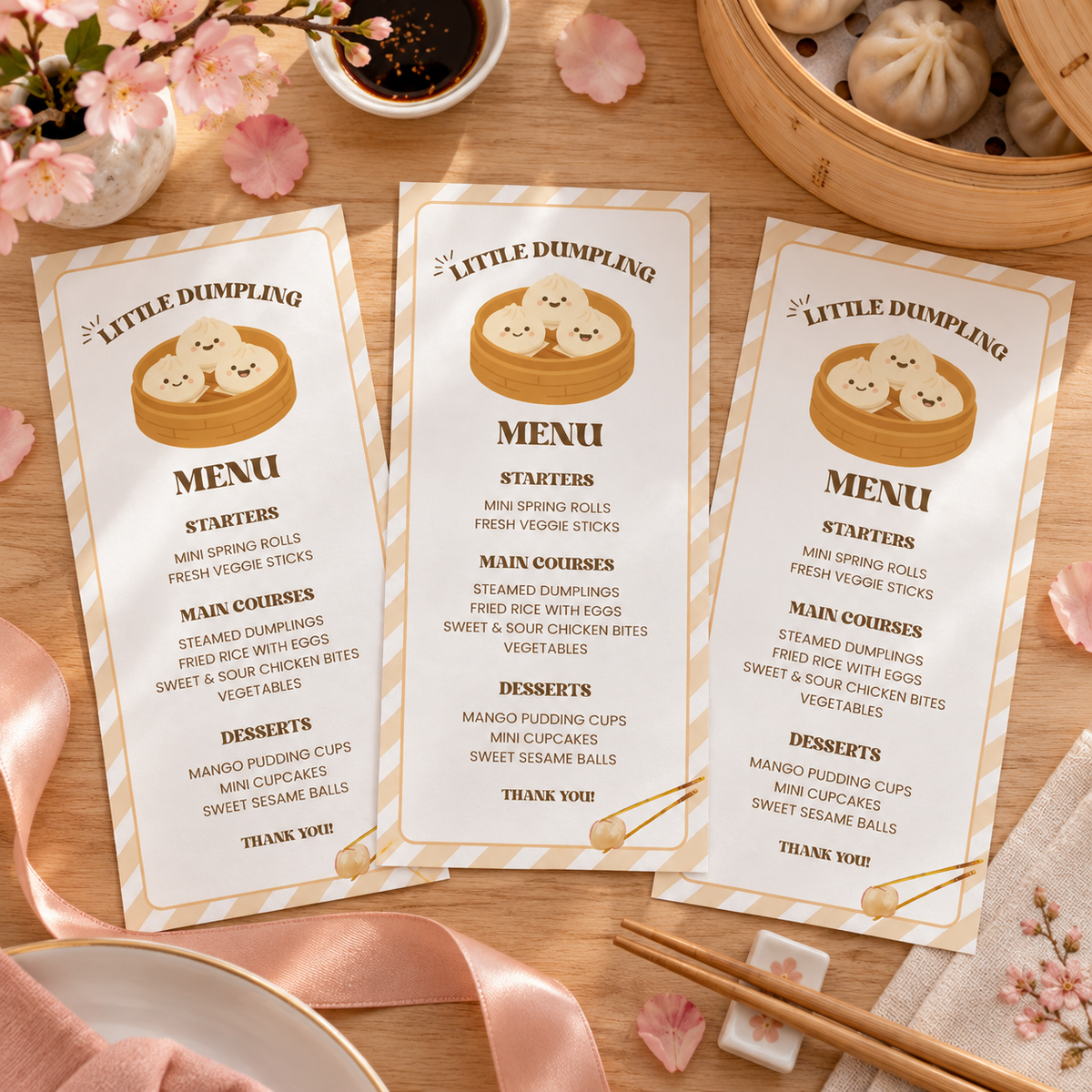 Flat lay of three printed little dumpling menu cards