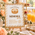 Close-up of the little dumpling mimosa bar sign next to champagne flutes