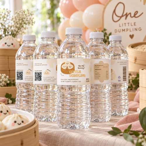 Water bottles with little dumpling labels on a 1st birthday party table