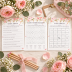 Flat lay of printable pink floral baby shower game cards with pencils and roses