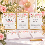 Baby in bloom game signs in gold frames on a baby shower game table