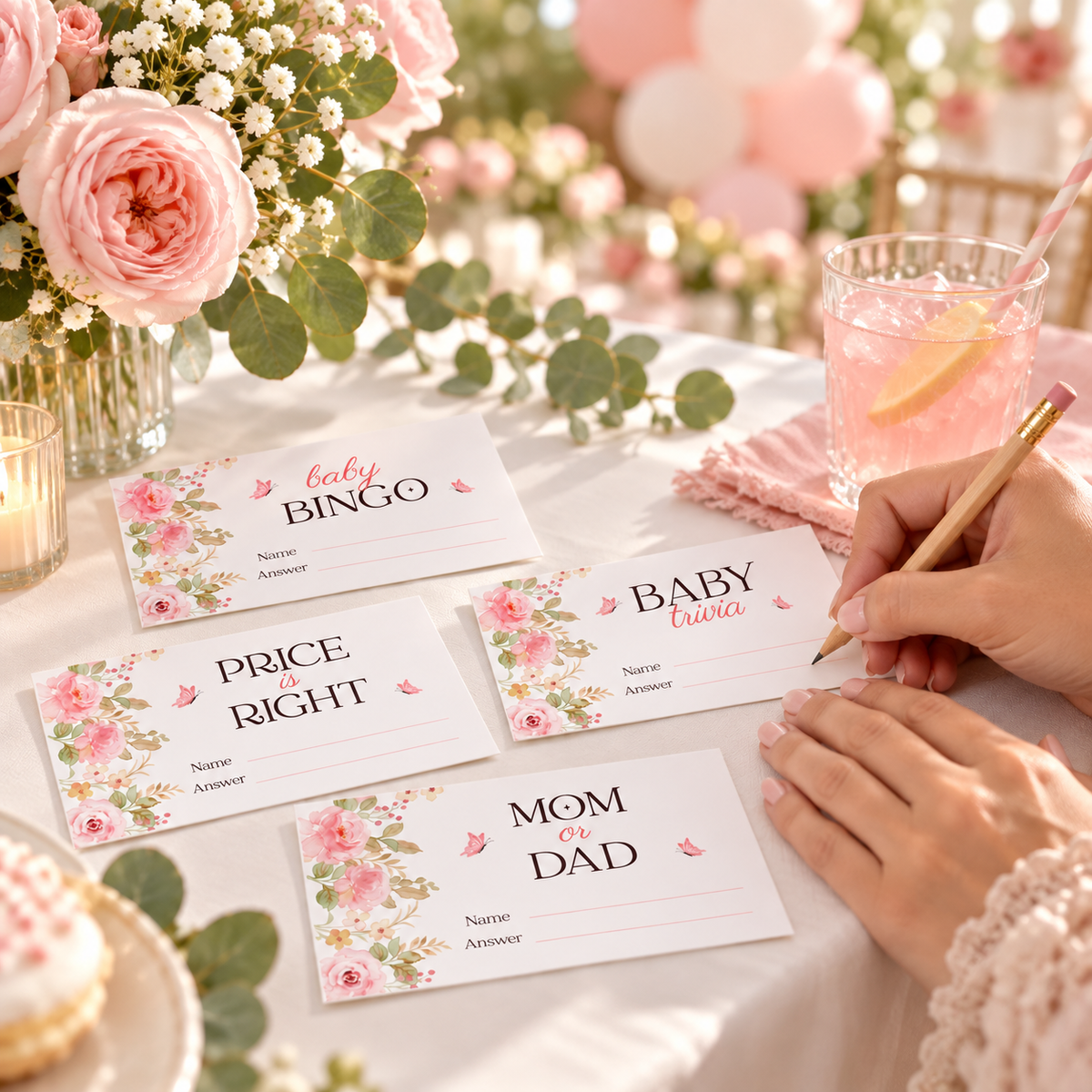 Guest writing an answer on a pink floral baby trivia ticket at a baby shower