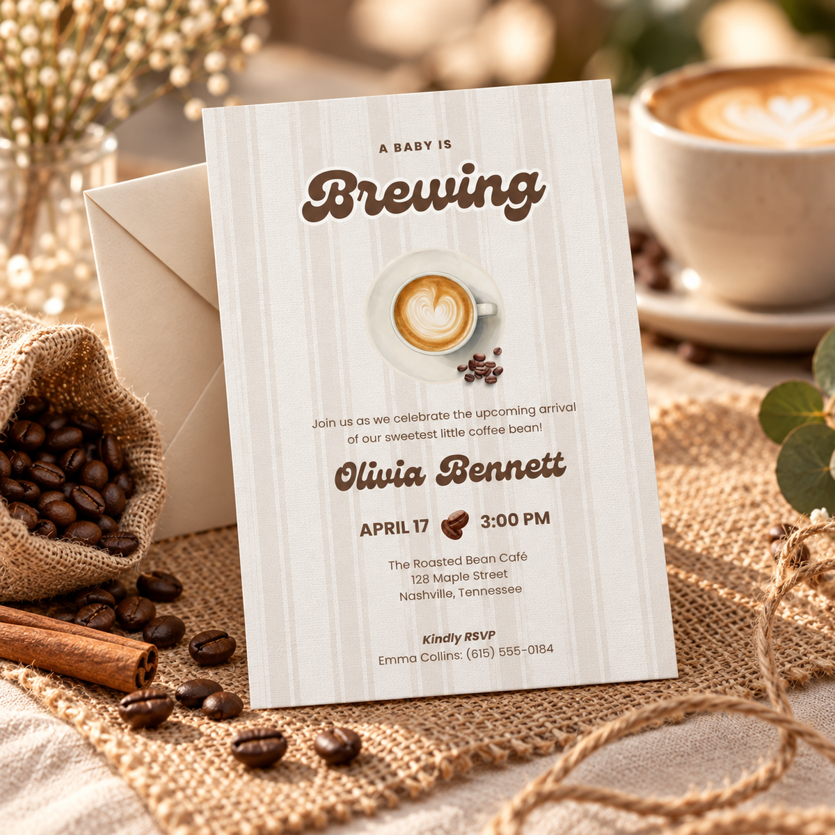 Baby Is Brewing invitation suite with cream envelope on burlap and linen