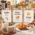 Baby Is Brewing coffee baby shower signs framed on a latte and dessert bar