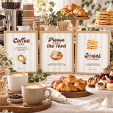 Baby Is Brewing coffee baby shower signs framed on a latte and dessert bar