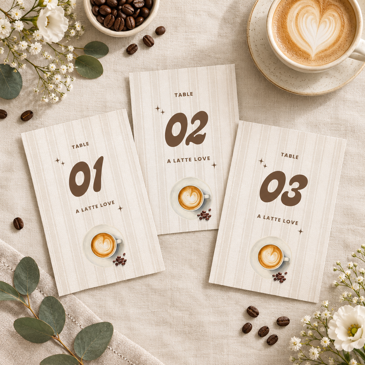 Baby Is Brewing table numbers 01, 02 and 03 flat lay with coffee beans and flowers