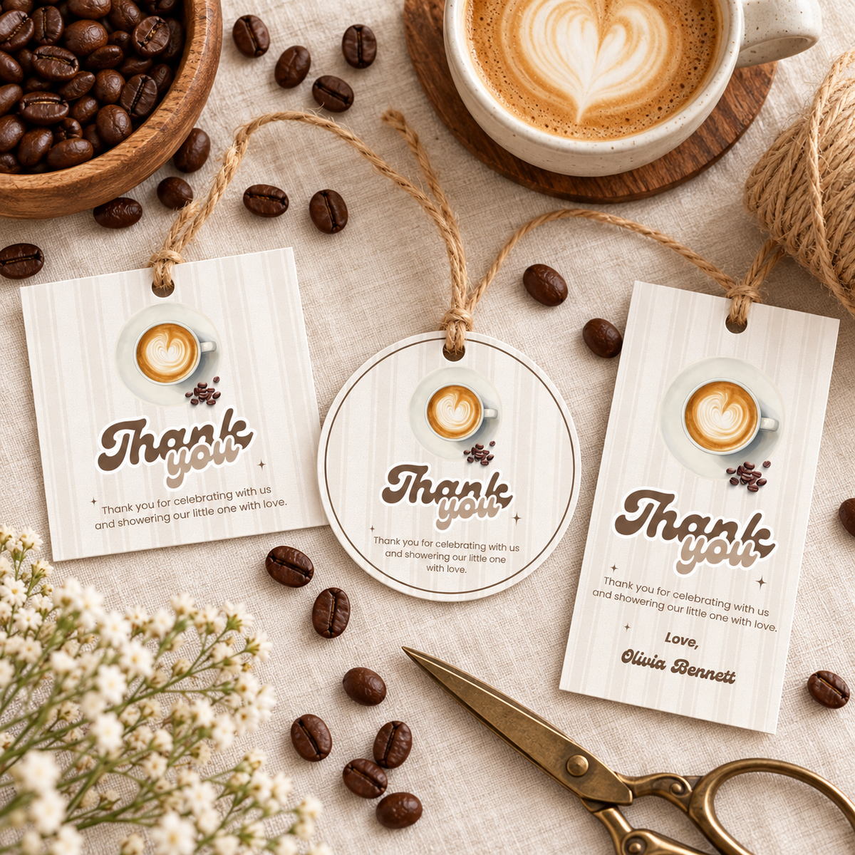 Square, round and rectangle Baby Is Brewing thank you tags in a flat lay with coffee beans