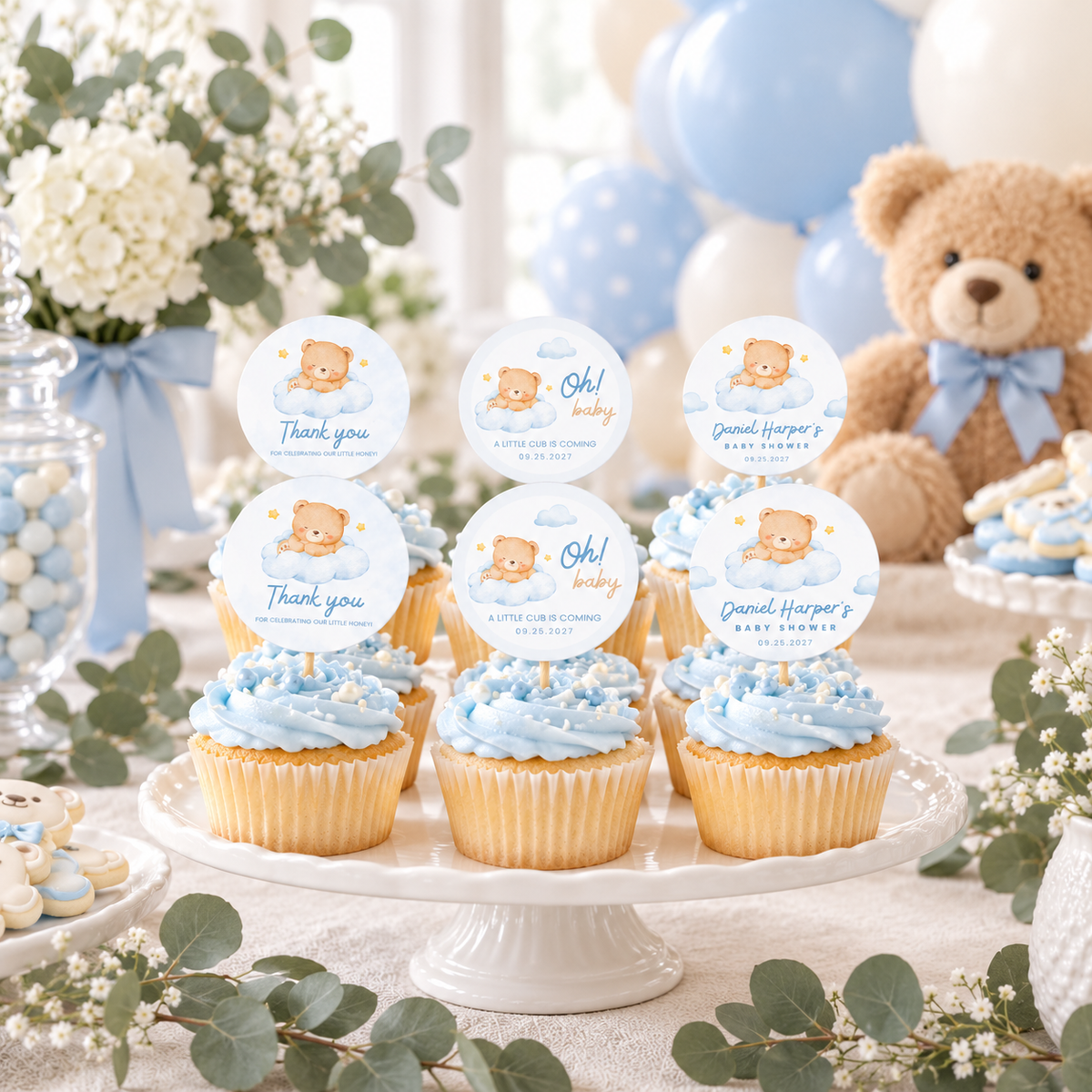 Teddy bear baby shower dessert table with greenery and Little Bear cupcake toppers