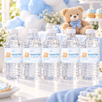 Row of water bottles with Little Bear labels on a drinks table with blue balloons