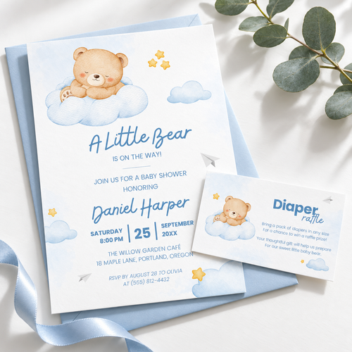 Little Bear diaper raffle card tucked in with the matching teddy bear baby shower invitation on a blue envelope