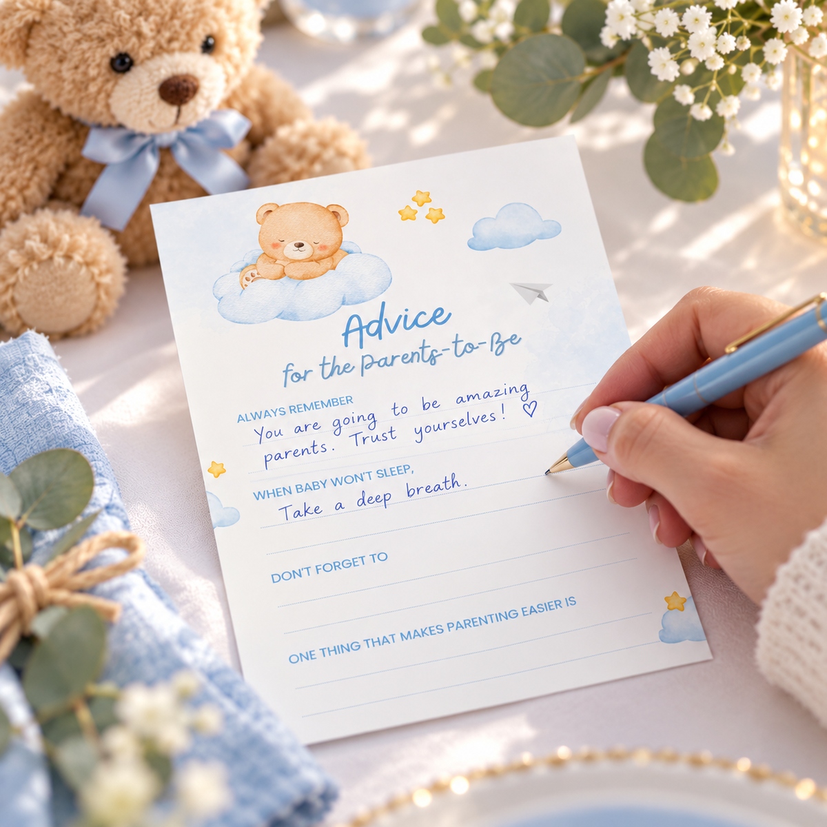 Guest writing advice on a Little Bear teddy bear advice card with a blue pen at a baby shower