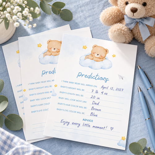 Little Bear baby predictions cards filled in on a blue baby shower table with pens and a teddy bear