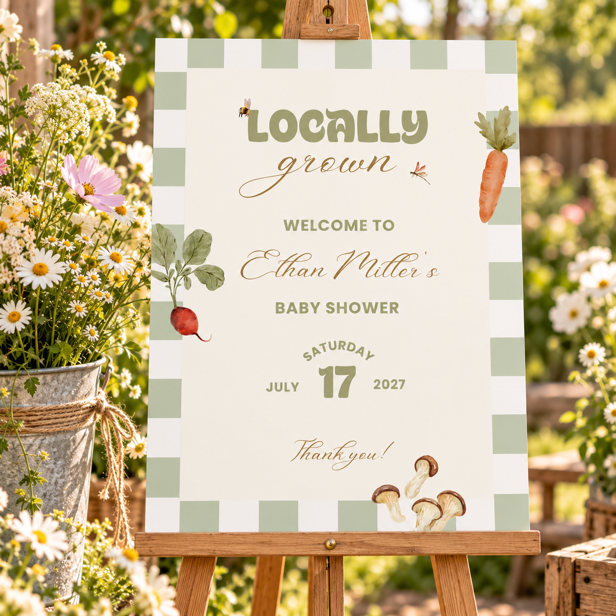 Close-up of the Locally Grown baby shower welcome sign with wildflowers