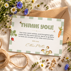Flat lay of the Locally Grown thank you card with jute twine and wildflowers
