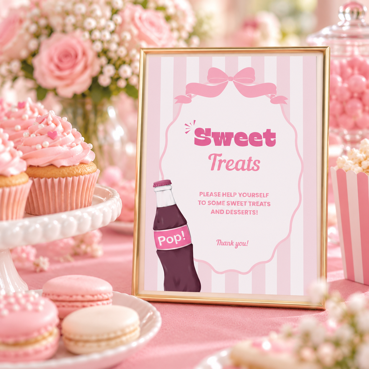 Close-up of the Ready To Pop Sweet Treats sign with pink cupcakes