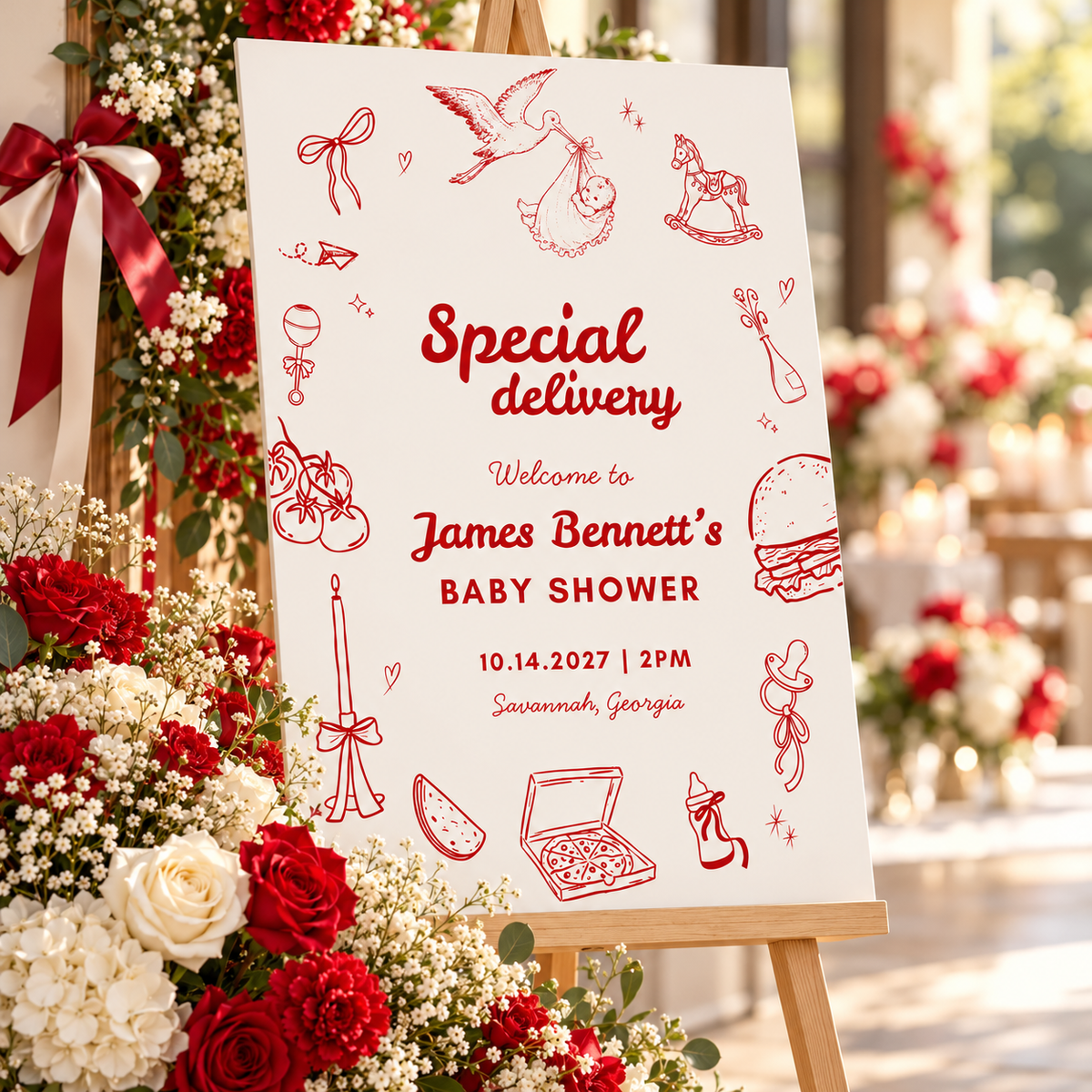 Close-up of the Special Delivery baby shower welcome sign with red and white flowers