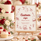 Special Delivery custom baby shower sign with stork doodles on a small easel on a dessert table