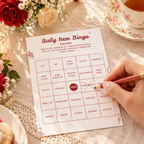 Guest marking a Special Delivery baby item bingo card with a pencil