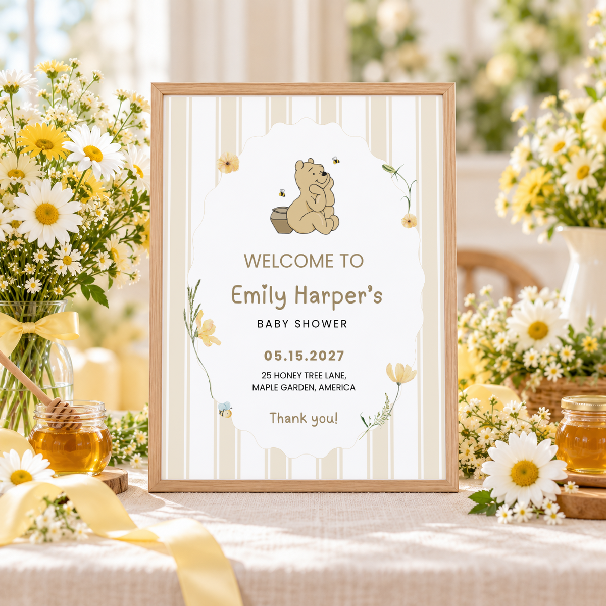 Close-up of the framed Classic Honey Bear welcome sign with daisies and honey jars