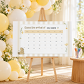 Classic Honey Bear baby shower due date calendar on a wooden easel with yellow and cream balloons and a cup of markers