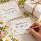 Guest writing her name on a Classic Honey Bear diaper raffle card at a baby shower